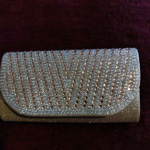 Rose gold clutch bag